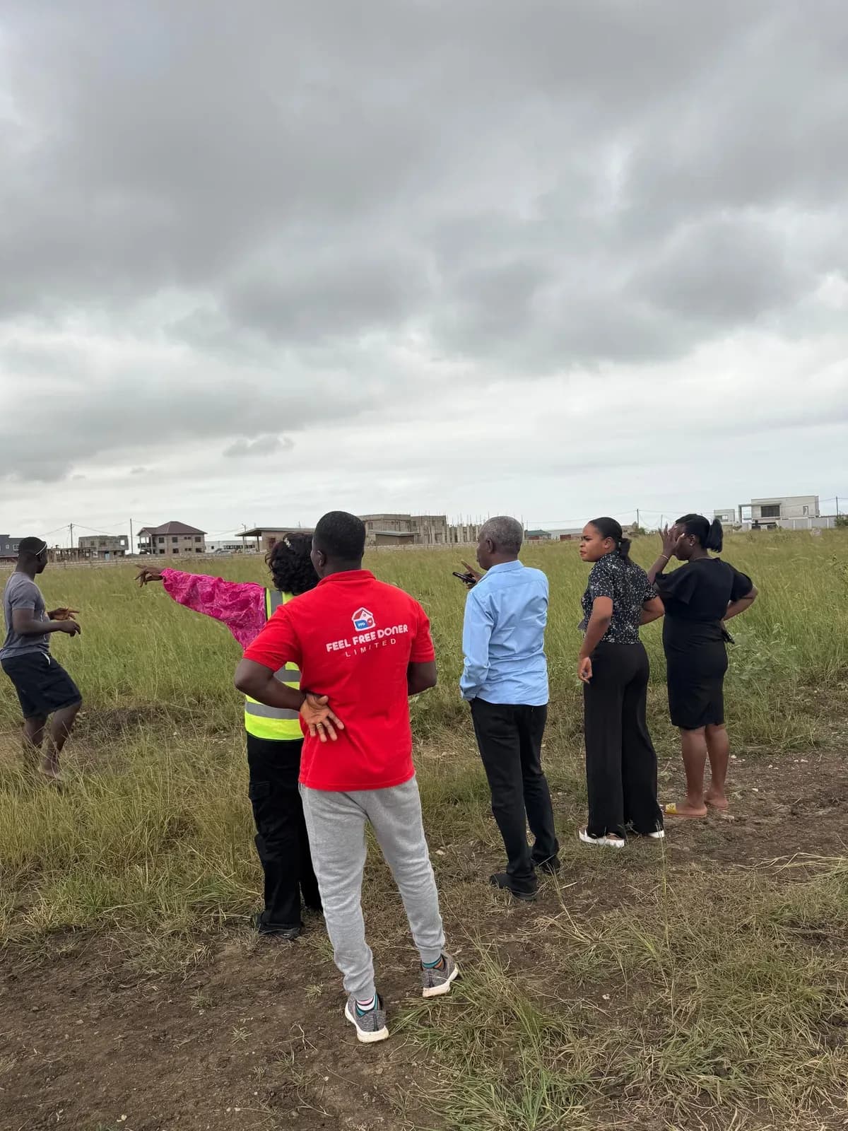 Feel Free Doner team surveying a buildable plot